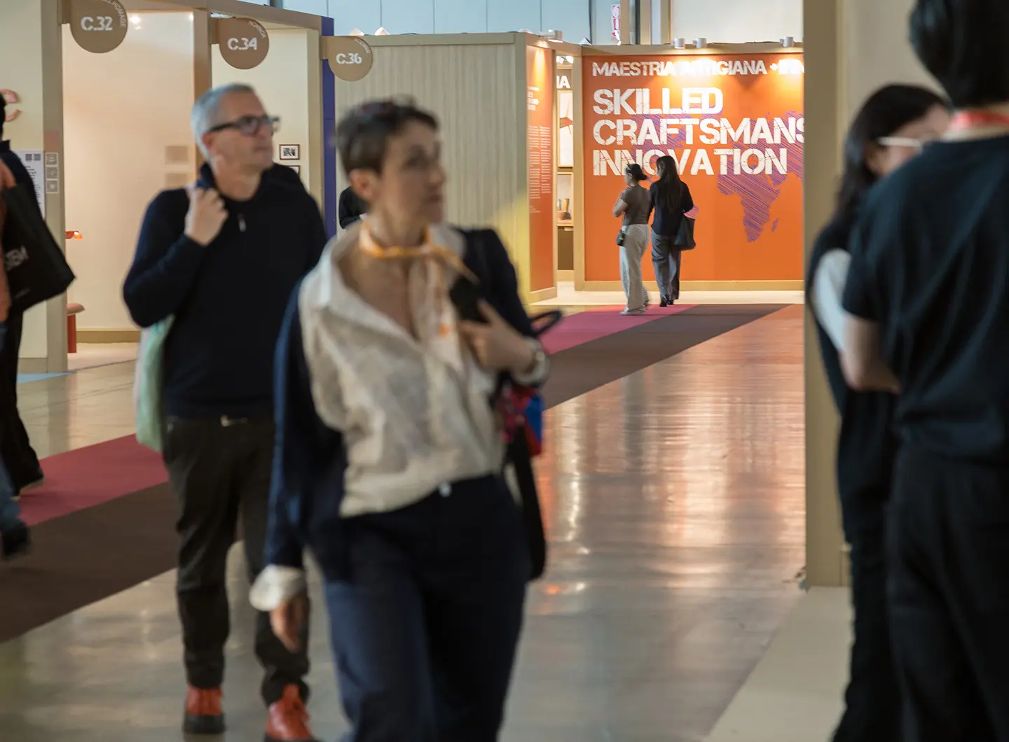 People looking at SaloneSatellite stands