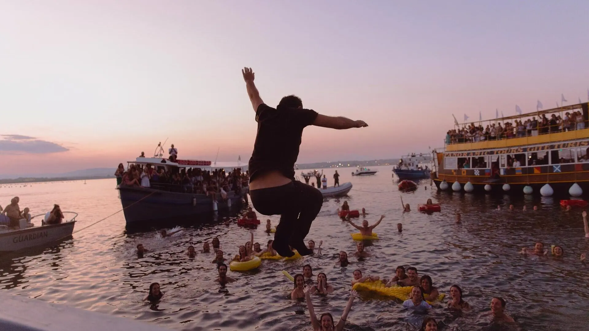 Ortigia, man jumping, seaside, sicily