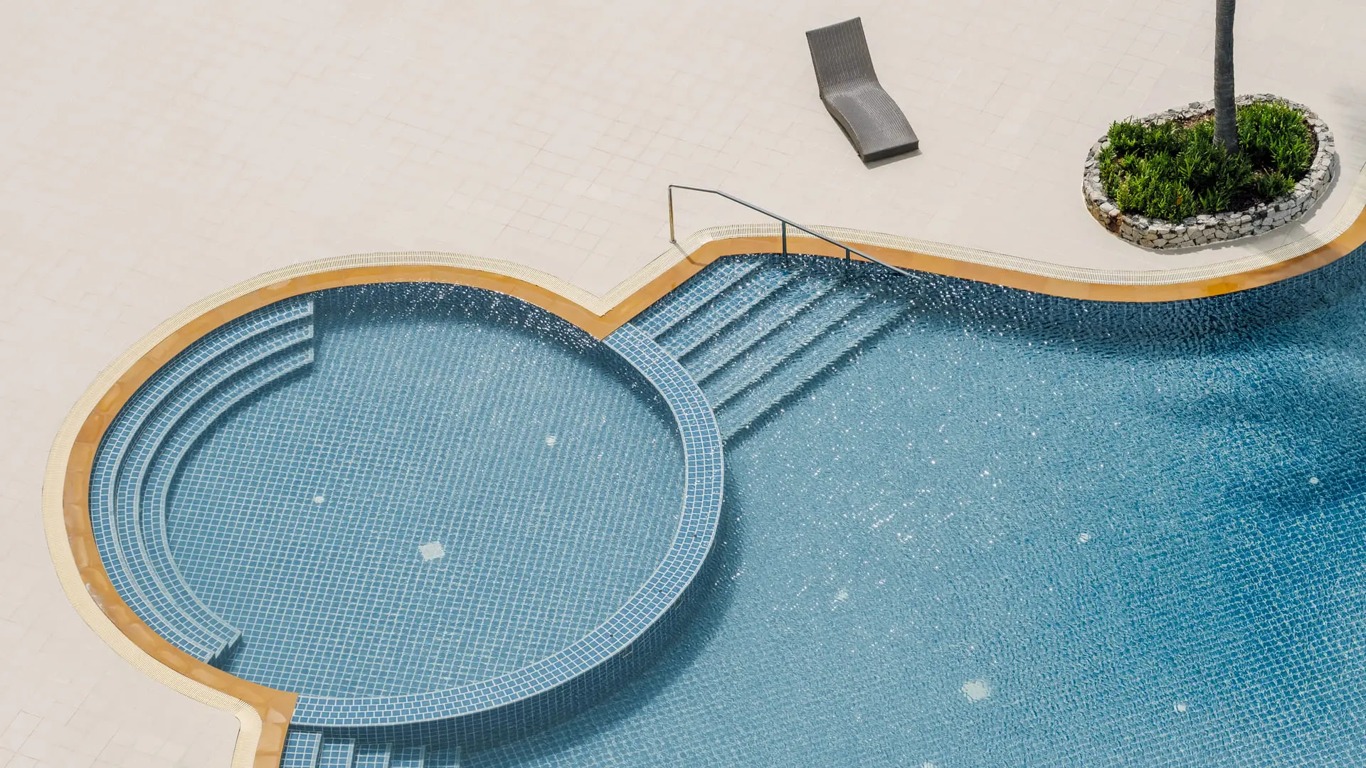 Swimming pool top view, blue tiles